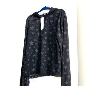 Black sheer crop top with star print.